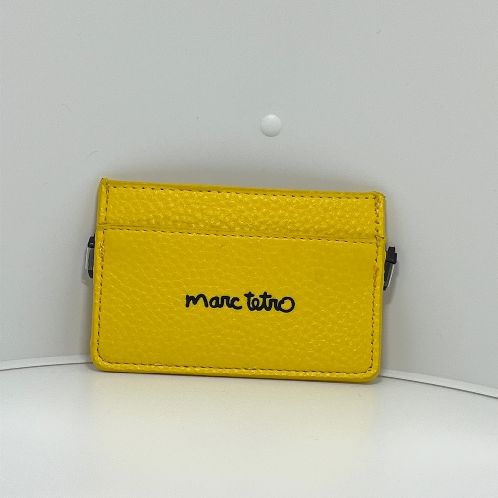Marc Tetro yellow card holder